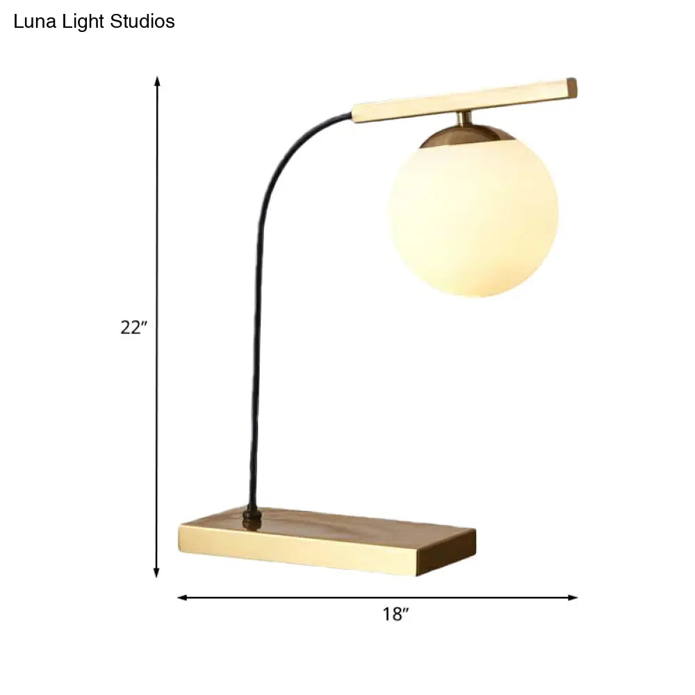 Modern Gold Linear Table Light With Milk Glass Ball Shade