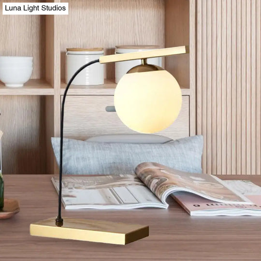 Modern Gold Linear Table Light With Milk Glass Ball Shade