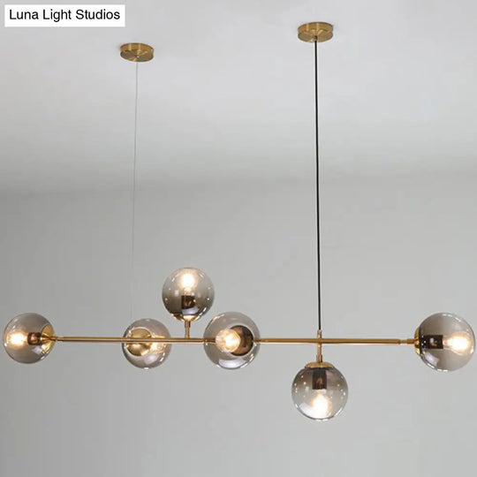 Modern Gold Metal Pendant Lighting - Spherical Smoke Glass With 6 Lights For Dining Table And