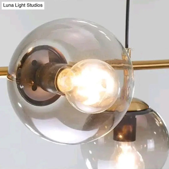 Modern Gold Metal Pendant Lighting - Spherical Smoke Glass With 6 Lights For Dining Table And