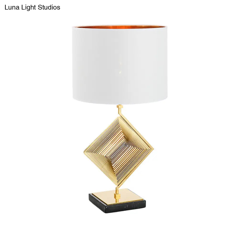 Modern Gold Metal Pyramid Bedside Lamp With White Fabric Shade