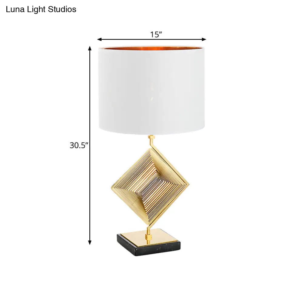 Modern Gold Metal Pyramid Bedside Lamp With White Fabric Shade