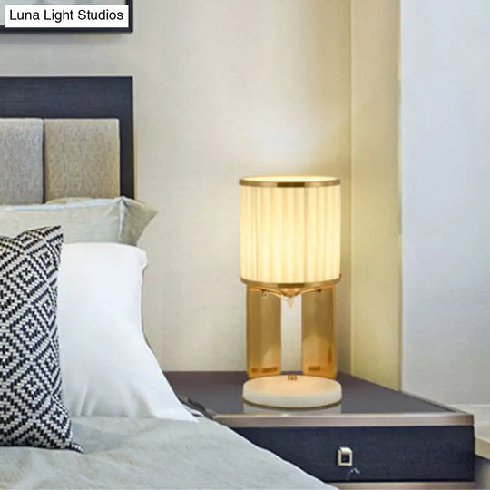 Modern Gold Nightstand Lamp With Marble Base Stylish Fabric Barrel Design For Bedside Lighting