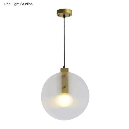 Modernist Gold Orb Pendant Lamp - Clear Glass Suspension Light For Dining Room