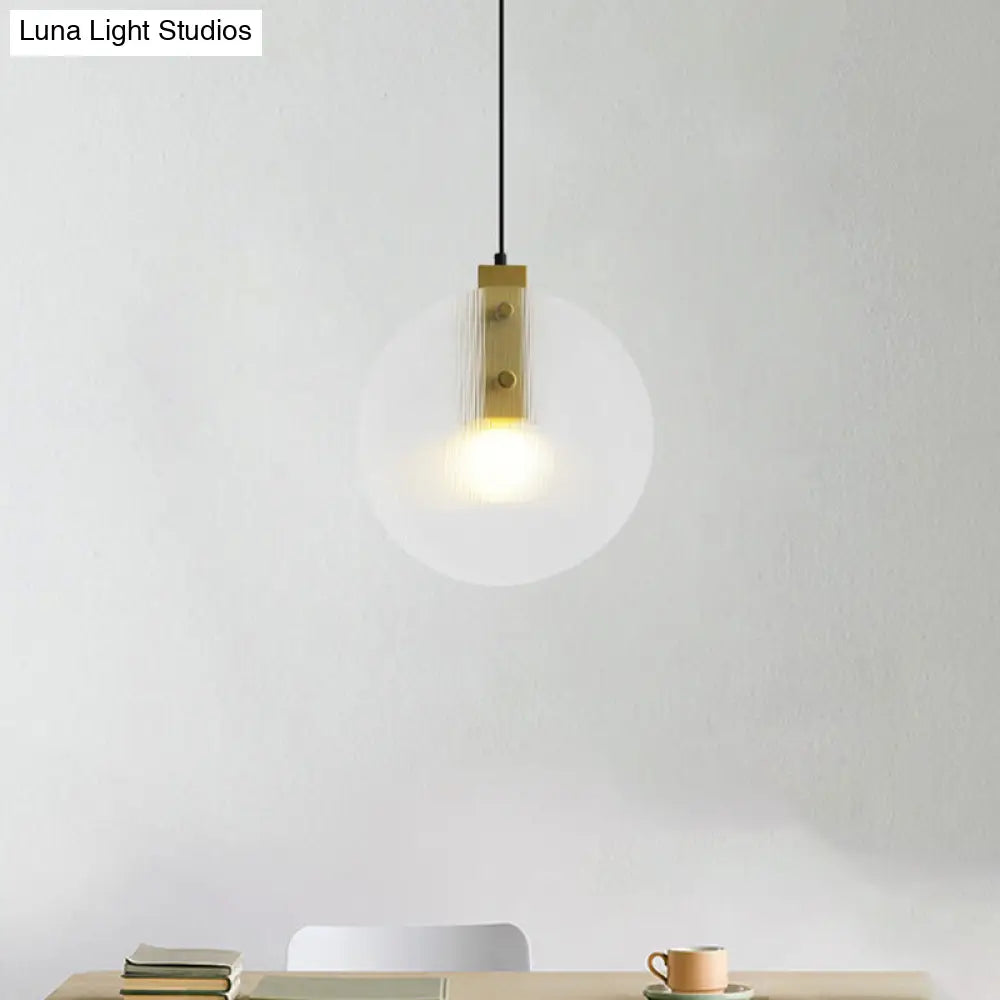 Modernist Gold Orb Pendant Lamp - Clear Glass Suspension Light For Dining Room