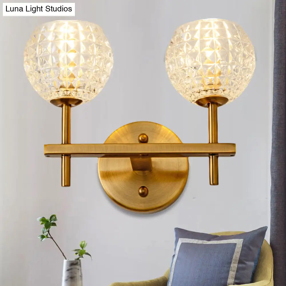 Modern Gold Orb Wall Sconce With Clear Grid Glass And Clean-Lined Arm For Hallway