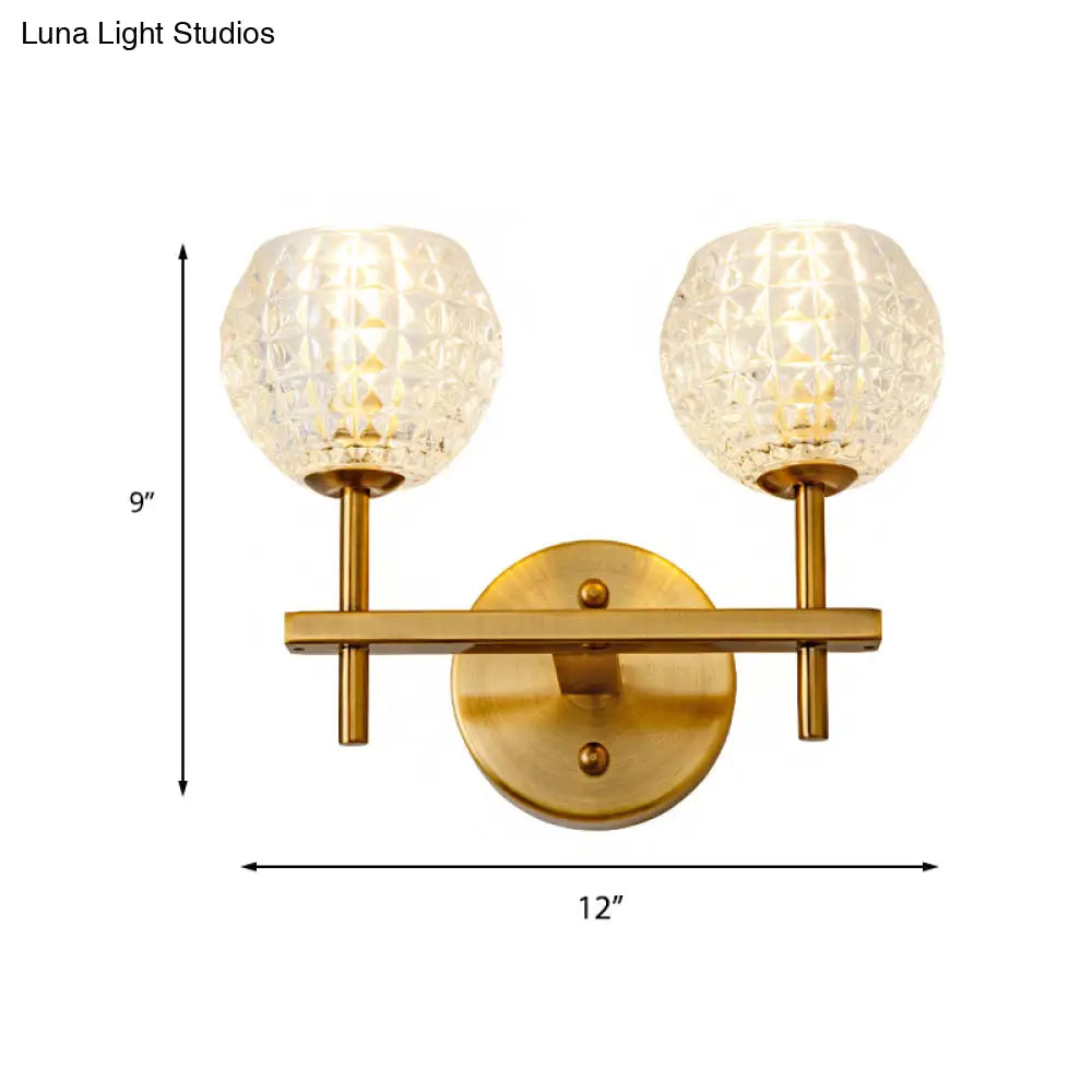 Modern Gold Orb Wall Sconce With Clear Grid Glass And Clean-Lined Arm For Hallway