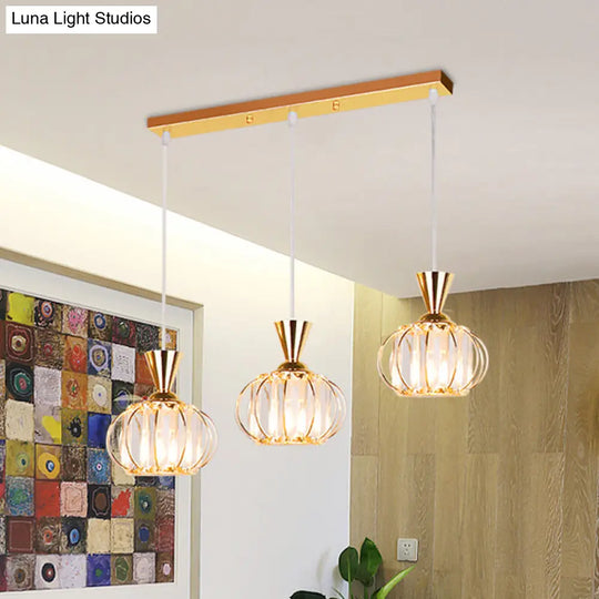 Modern Gold Oval Cage Suspension Light With Crystal Prisms - 3-Head Hanging Lamp