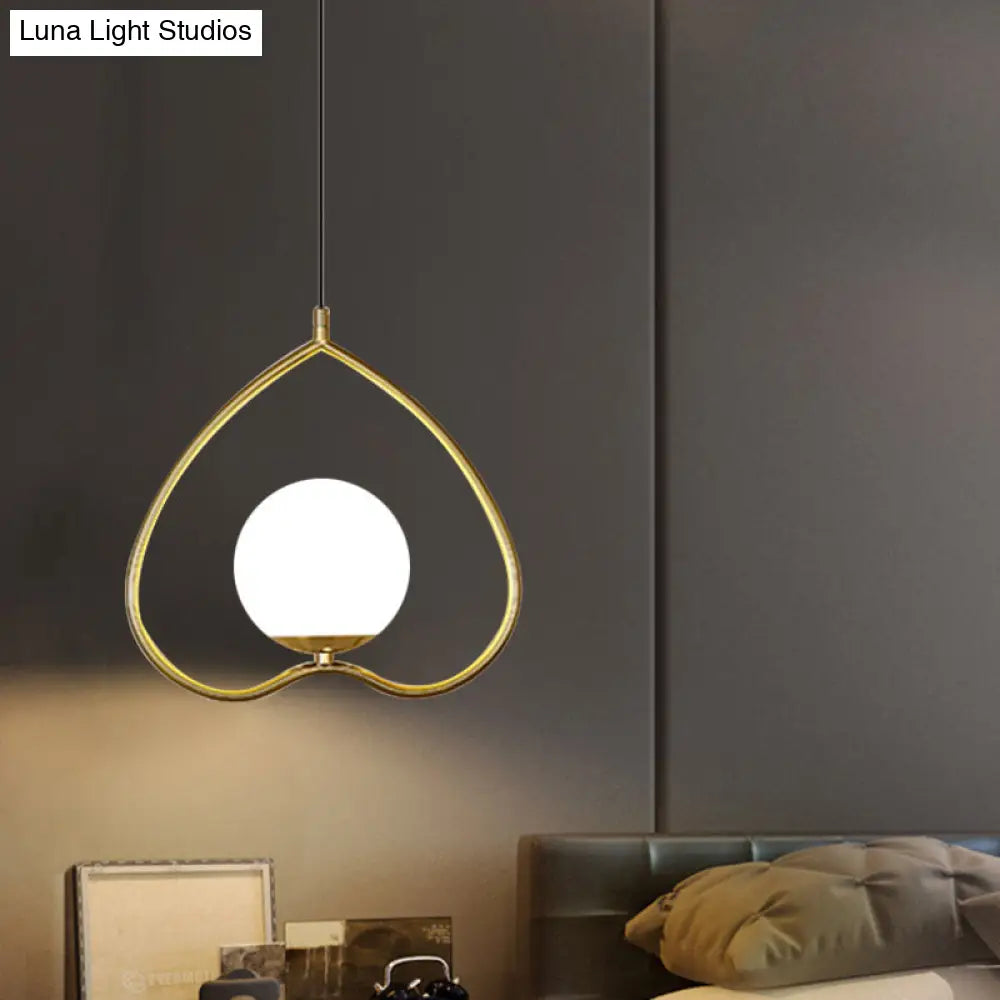 Gold Single Pendulum Light With Heart-Shaped Down Lighting And Opal Glass Shade