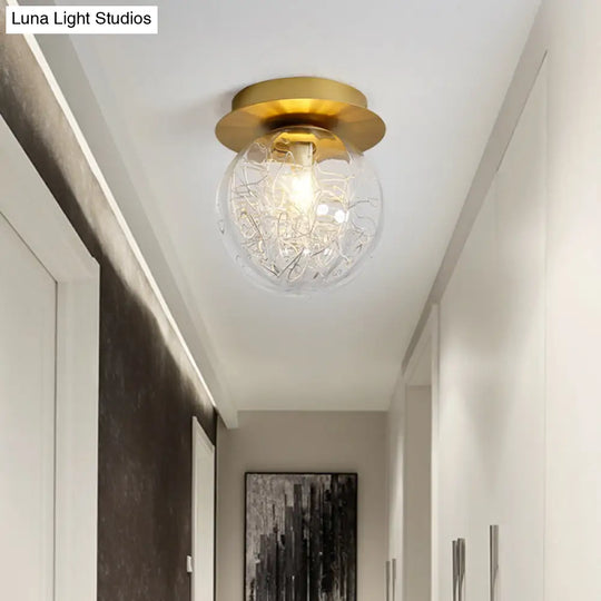 Modern Gold Pumpkin Ball Flush Light Fixture With Clear Glass Shade And Metal Line Inside