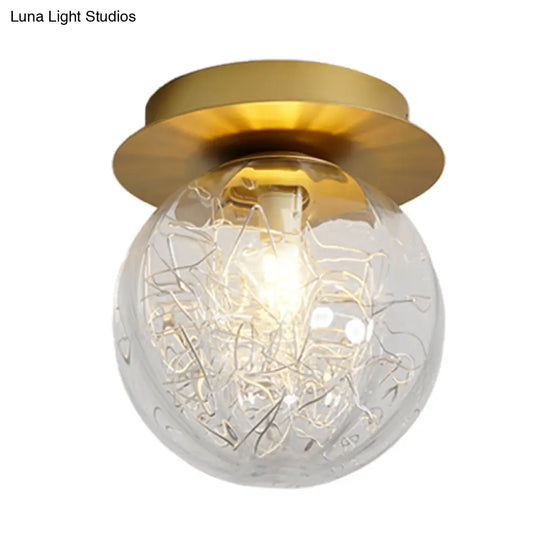 Modern Gold Pumpkin Ball Flush Light Fixture With Clear Glass Shade And Metal Line Inside