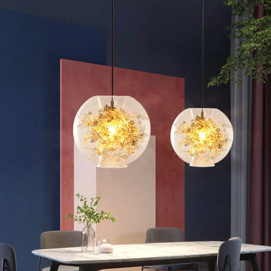 Modern Gold Sphere Pendant Light With Clear Glass And Shattered Leaves Detail