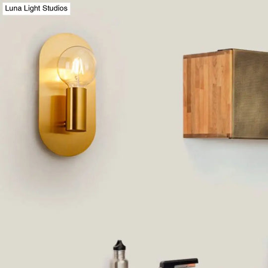 Modern Gold Wall Lamp With Exposed Bulb And Metal Backplate