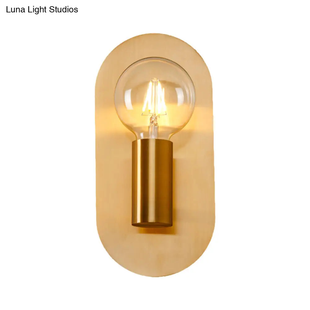 Modern Gold Wall Lamp With Exposed Bulb And Metal Backplate