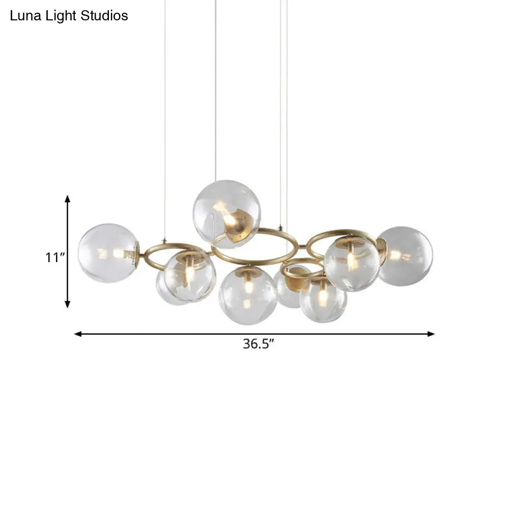 Modern 9-Light Gold Chandelier With Bubble Glass Shades