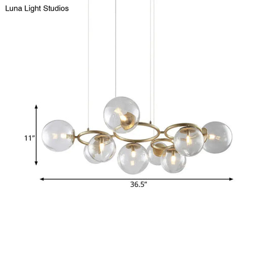 Modern 9-Light Gold Chandelier With Bubble Glass Shades