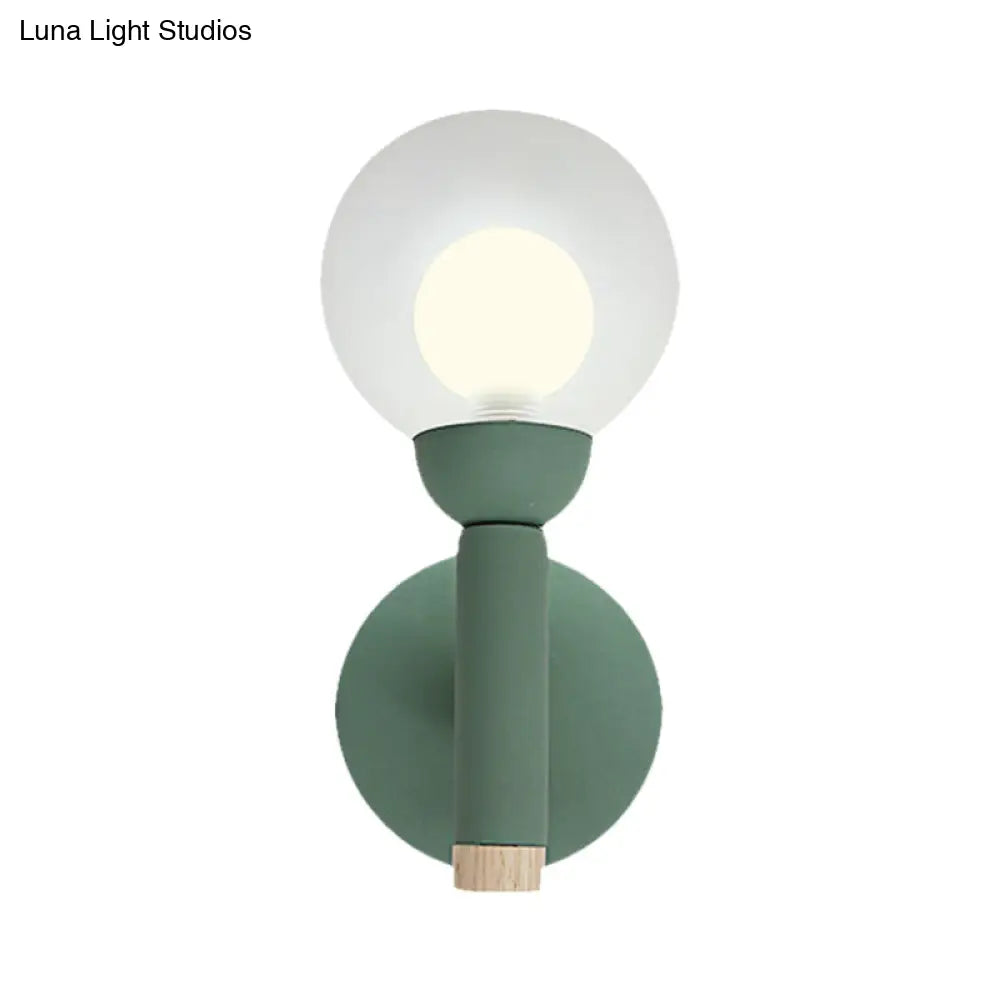 Modern Macaron Style Torch Wall Sconce With Clear Glass Shade - 1 Light Mini In Green/Grey/White