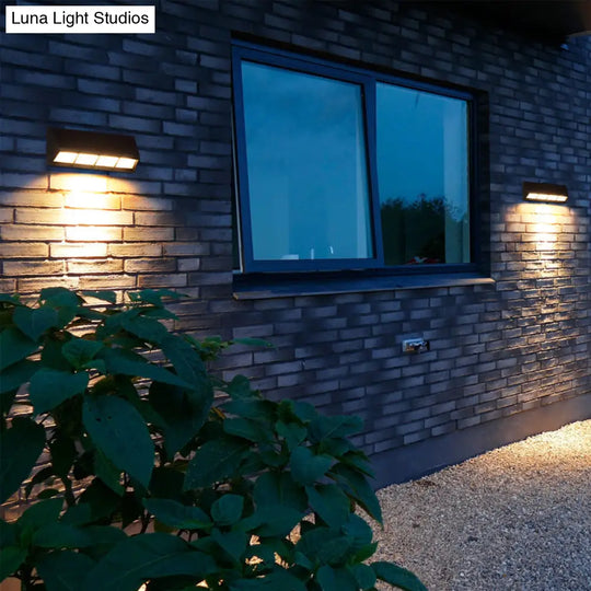 Modern Matte Black Led Outdoor Wall Sconce With Triangular Prism Design