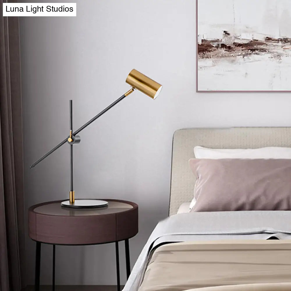 Modern Metal Cylinder Table Lamp In Black And Gold With Rotating Node