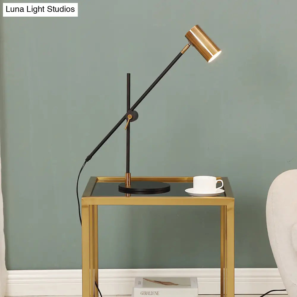 Modern Metal Cylinder Table Lamp In Black And Gold With Rotating Node