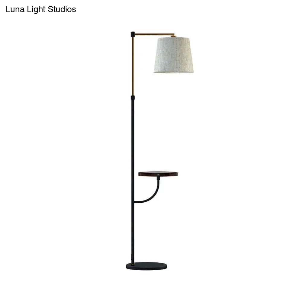 Modern Metal Floor Lamp With Right Angle Arm Barrel Beige Shade In Black-Gold - 1 Light For Living