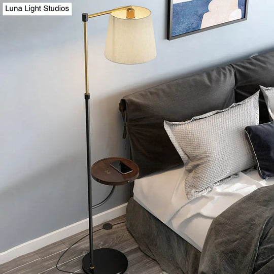 Modern Metal Floor Lamp With Right Angle Arm Barrel Beige Shade In Black-Gold - 1 Light For Living