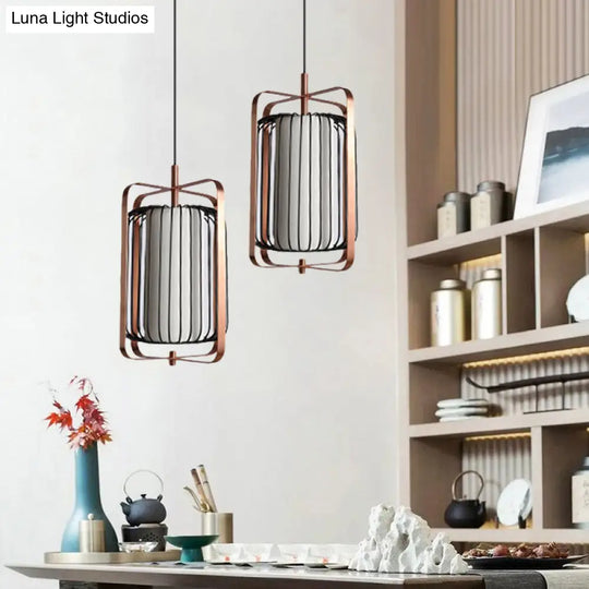 Modern Metal Pendant Lamp With Rose Gold Frame And Black Cage 1 Light White Fabric Shade