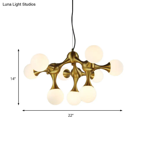 Modern Metal Starburst Chandelier With Glass Globe Shades - 5/9/15 Lights In Brass