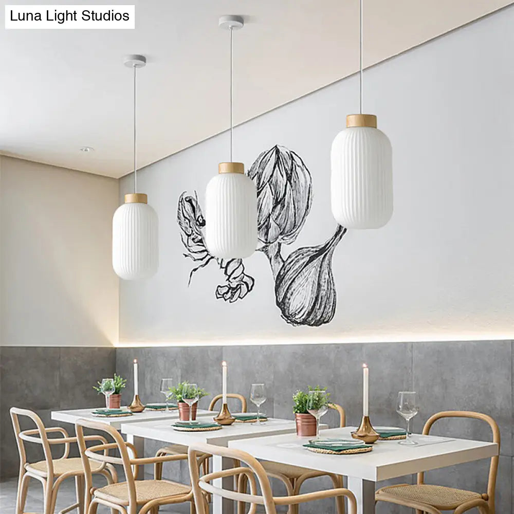 Modern 1-Light Milk Glass Ribbed Cylinder Pendant Light For Restaurants - 5.5 8 12 Diameter White