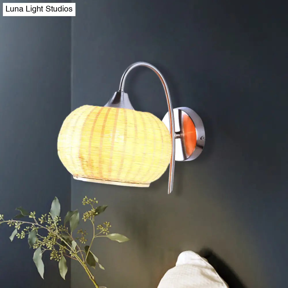 Modern Rattan Drum Sconce Wall Light - Chrome Finish 1-Light Lamp With Curved Metal Arm