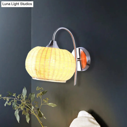 Modern Rattan Drum Sconce Wall Light - Chrome Finish 1-Light Lamp With Curved Metal Arm