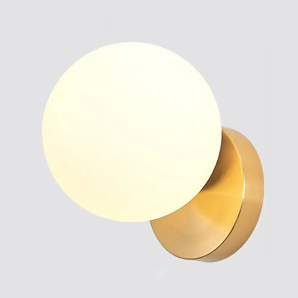 Modern Simplicity Wall Sconce: 1-Light Metal Lamp With Glass Ball Shade Gold / Milk White