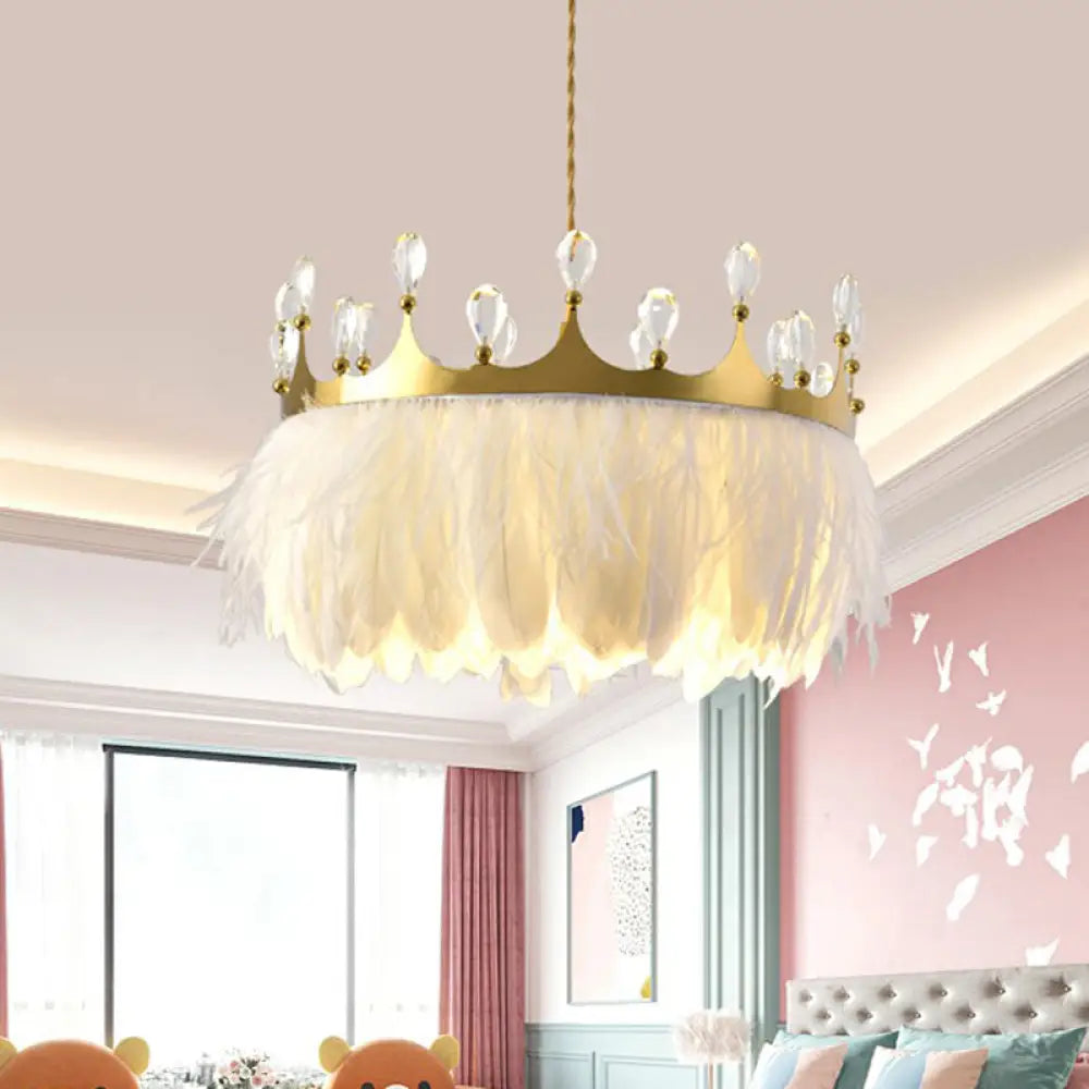 Modern Single Gold Crown Pendant Light With Crystal And Feather Accents - Metallic Suspension