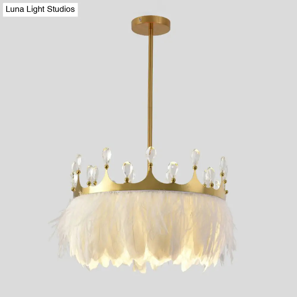 Modern Single Gold Crown Pendant Light With Crystal And Feather Accents - Metallic Suspension