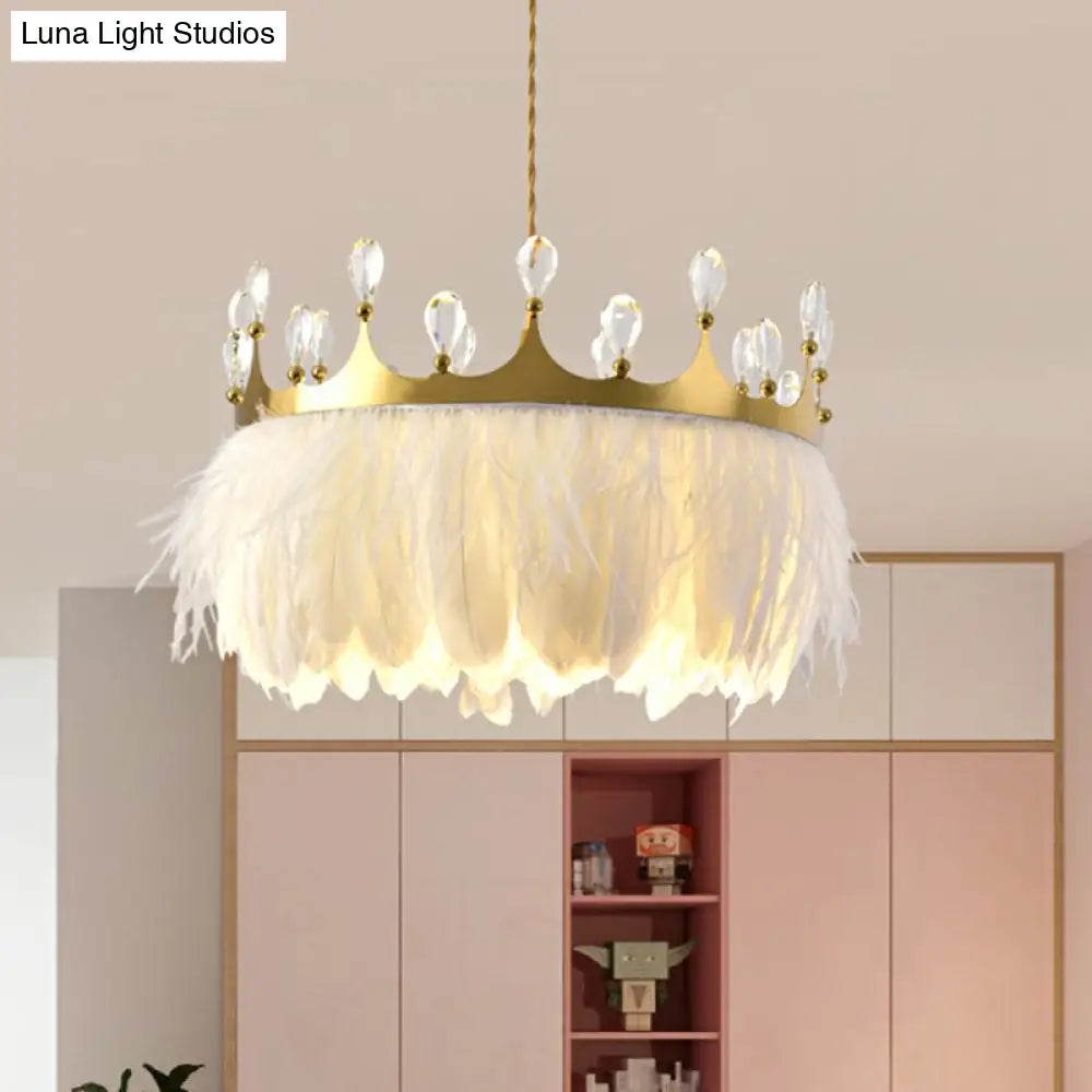 Modern Single Gold Crown Pendant Light With Crystal And Feather Accents - Metallic Suspension