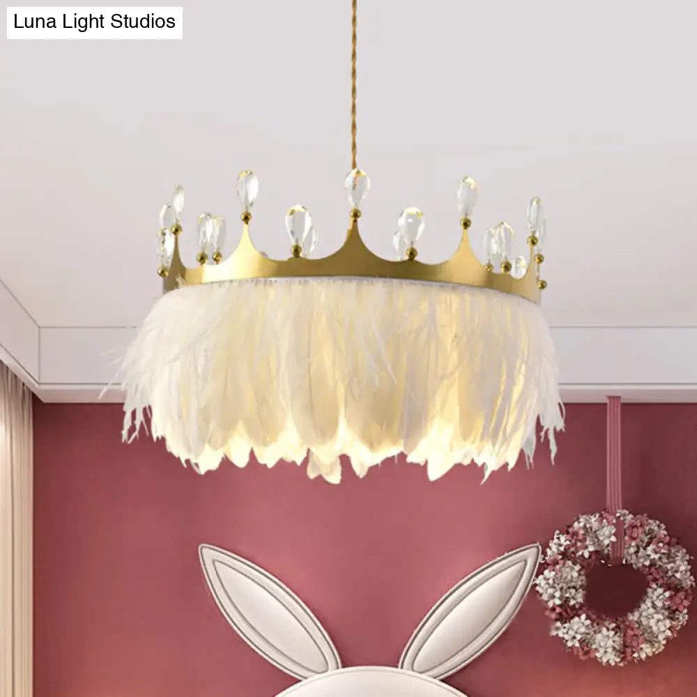 Modern Single Gold Crown Pendant Light With Crystal And Feather Accents - Metallic Suspension