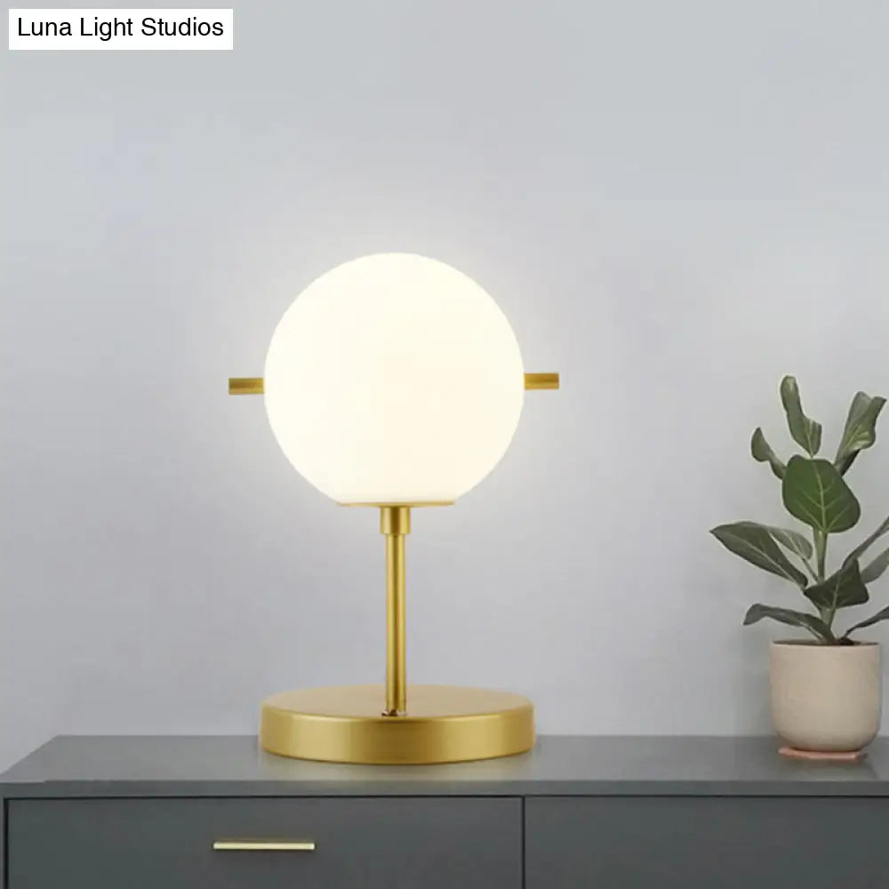 Modern Spherical Night Table Lamp In Gold With White Glass Head