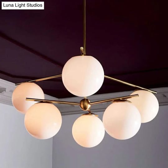 Minimalist 6-Light Gold Ceiling Chandelier With White Glass Globes For Living Room