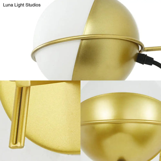 Modern White Glass Globe Wall Sconce With Golden Mount