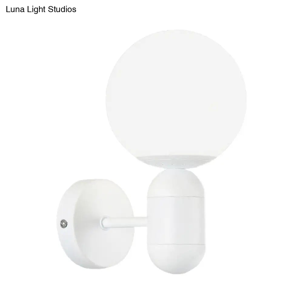 Modern White Wall Lamp With Globe Shade Capsule Body - Metal & Glass Light For Meeting Room