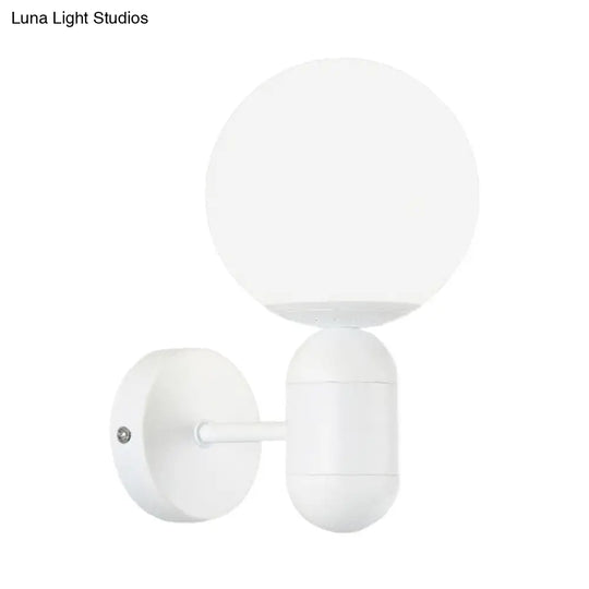 Modern White Wall Lamp With Globe Shade Capsule Body - Metal & Glass Light For Meeting Room