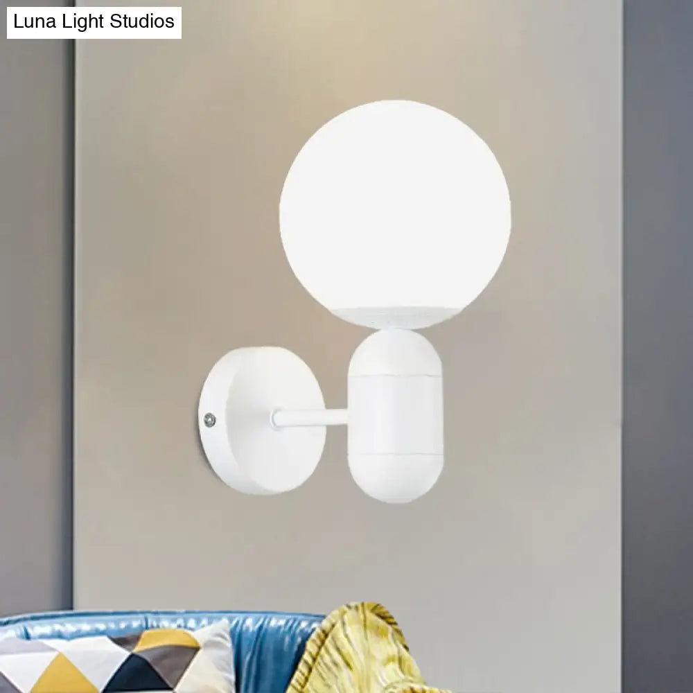 Modern White Wall Lamp With Globe Shade Capsule Body - Metal & Glass Light For Meeting Room