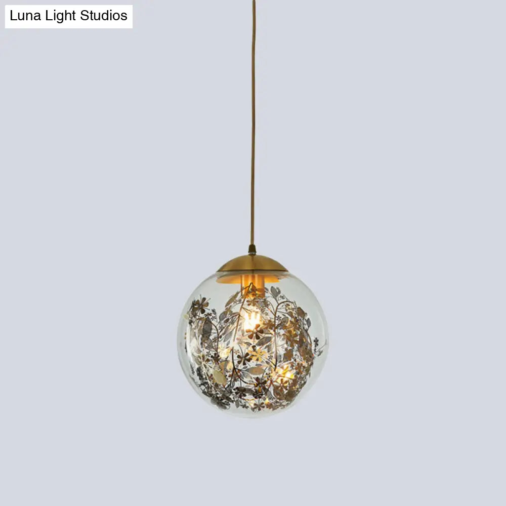 Modern Clear Glass Yellow Ball Pendant Lamp With Shattered Leaves Decoration - 1-Head Ceiling Light