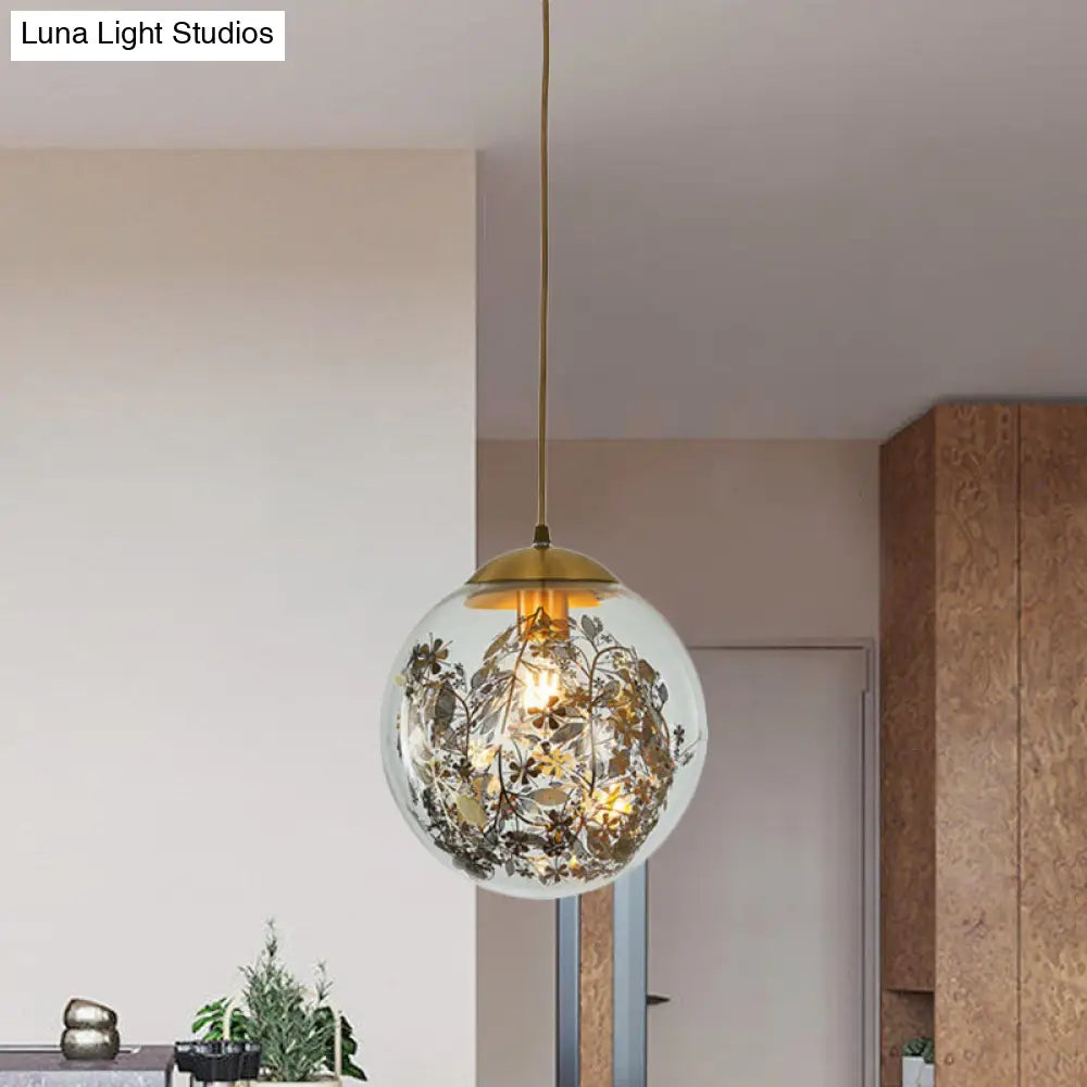 Modern Clear Glass Yellow Ball Pendant Lamp With Shattered Leaves Decoration - 1-Head Ceiling Light