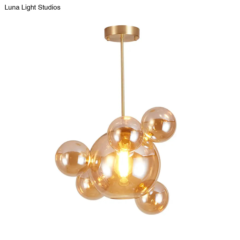 Modernist Amber Glass Pendant Lamp For Dining Table - 1 Light Bubble Shape Hanging Kit