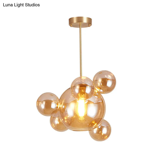 Modernist Amber Glass Pendant Lamp For Dining Table - 1 Light Bubble Shape Hanging Kit