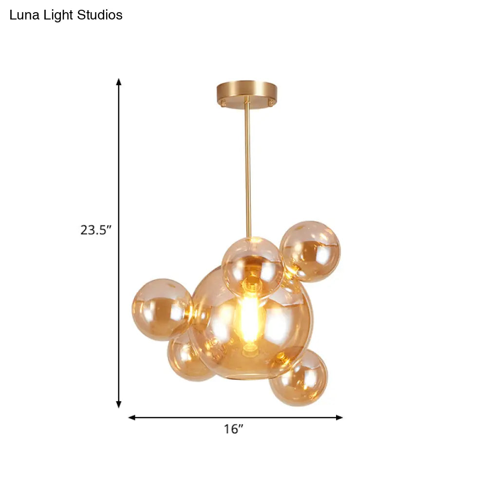 Modernist Amber Glass Pendant Lamp For Dining Table - 1 Light Bubble Shape Hanging Kit