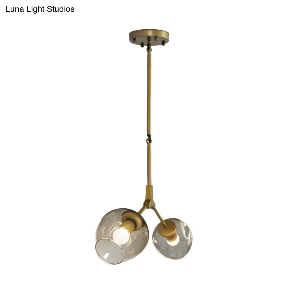 Modernist Black/Gold Bifurcated Chandelier With Open Dimpled Glass Suspension Pendant - 2 Lights