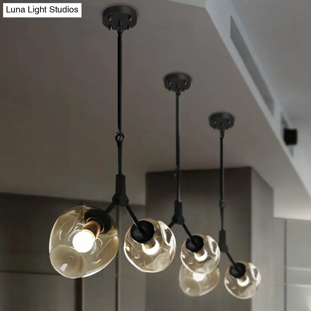 Modernist Black/Gold Bifurcated Chandelier With Open Dimpled Glass Suspension Pendant - 2 Lights