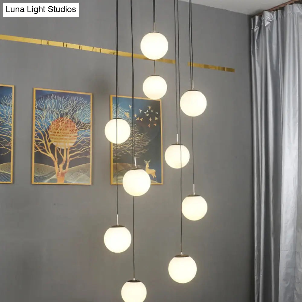 Modernist Cream Glass Ball Pendant Light With Black Suspension - 10 Heads Living Room Lighting